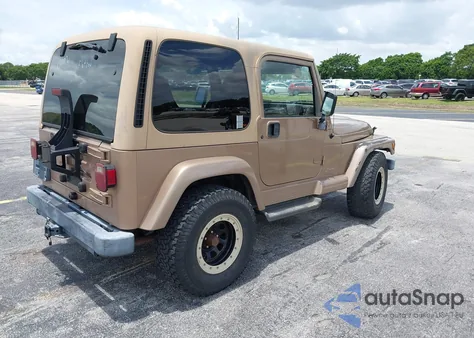 1999 Jeep Wrangler Sahara z USA, uszkodzony, nr VIN 1J4FY49S2XP432180